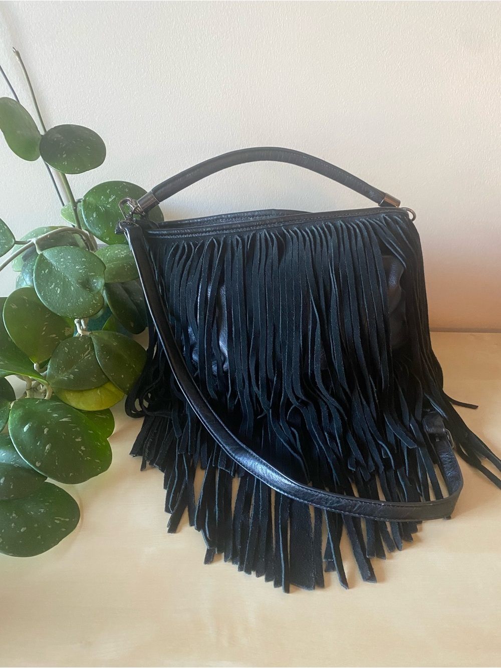 Black shoulder bag with genuine suede fringe and optional crossbody strap